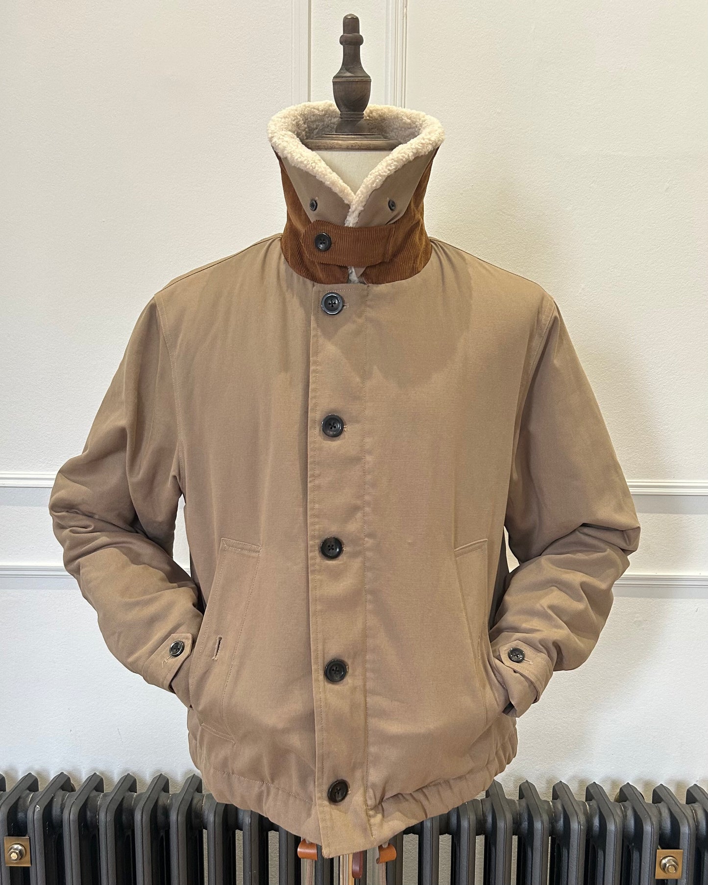 Supermoon Deck Jacket in cotton duck canvas, product image 2. Showing front view with collar worn turned up and hand in pocket 
