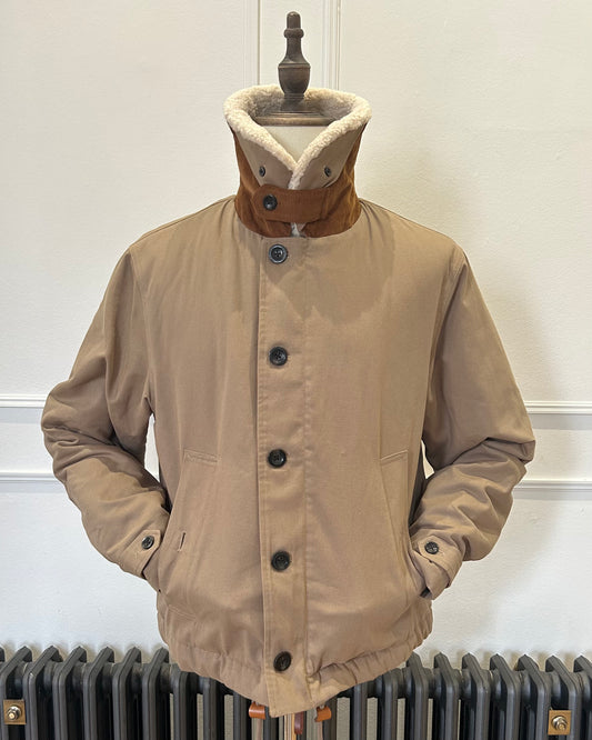 Supermoon Deck Jacket in cotton duck canvas, product image 2. Showing front view with collar worn turned up and hand in pocket 