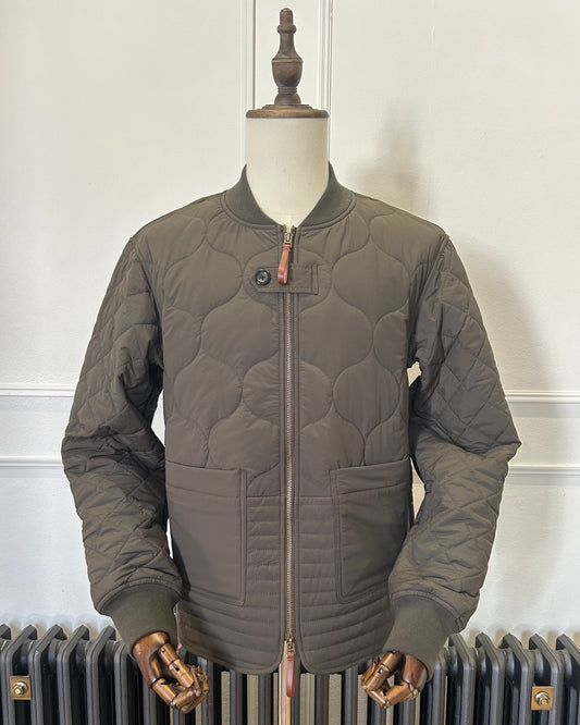 Supermoon Field Liner quilted nylon jacket, product image 1. Showing front view of mixed quilt liner jacket with double zip 